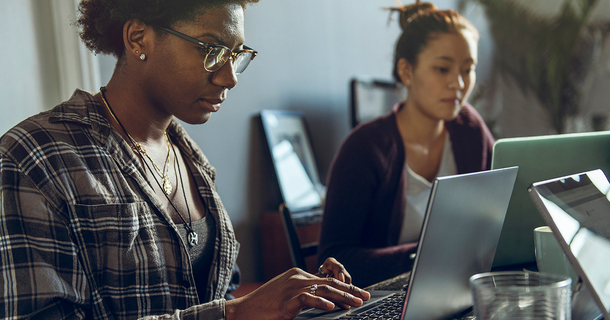 students_looking_computers Students studying on computers