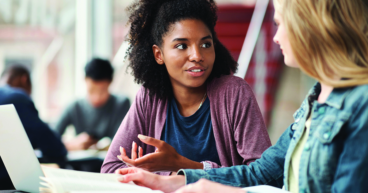 students_discussing_problem Students talking about a problem in class